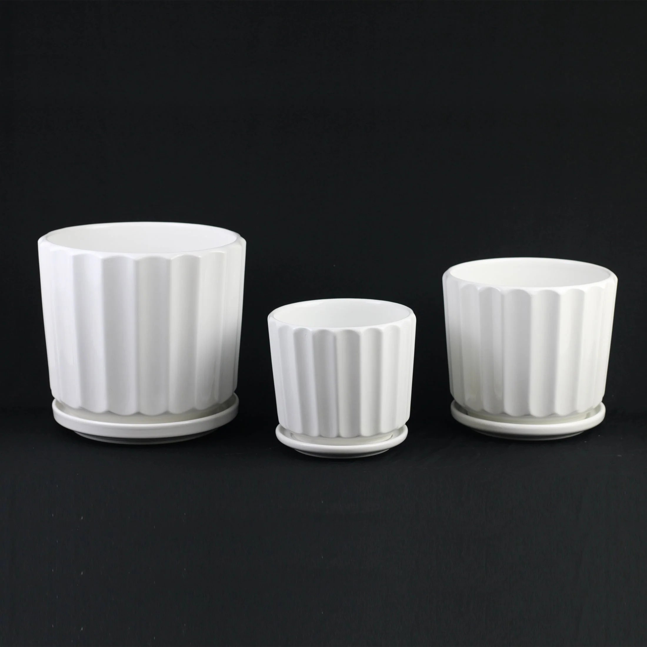3-Piece White Ceramic Planter Pot Set with Fluted Design & Saucers - Image 4