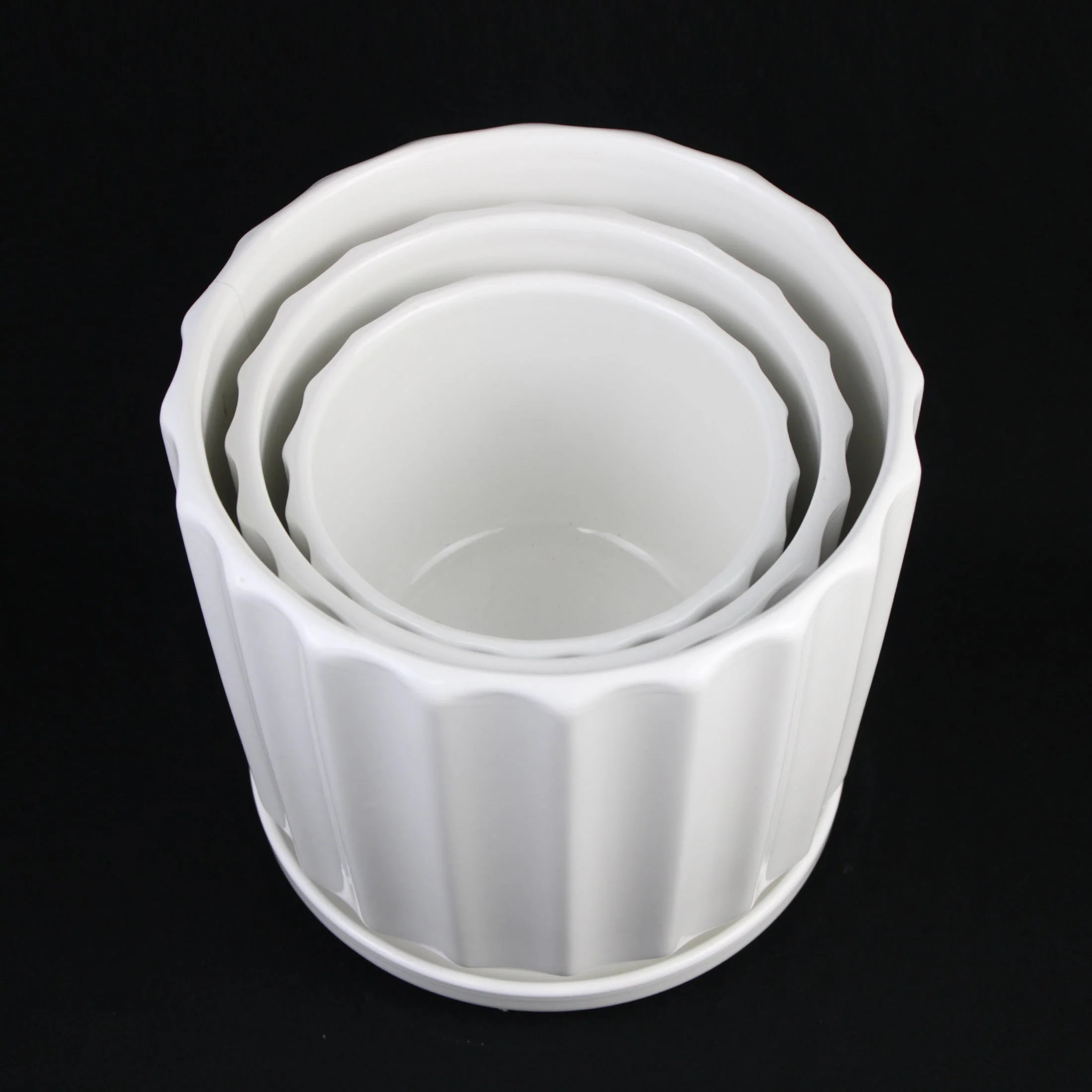 3-Piece White Ceramic Planter Pot Set with Fluted Design & Saucers - Image 6