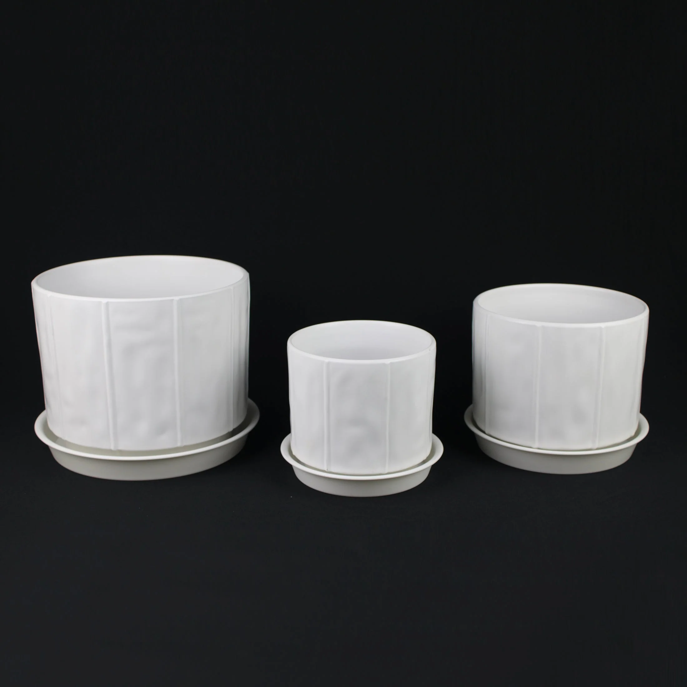 3-Piece White Stoneware Planter Pot Set with Soft Vertical Texture - Image 12