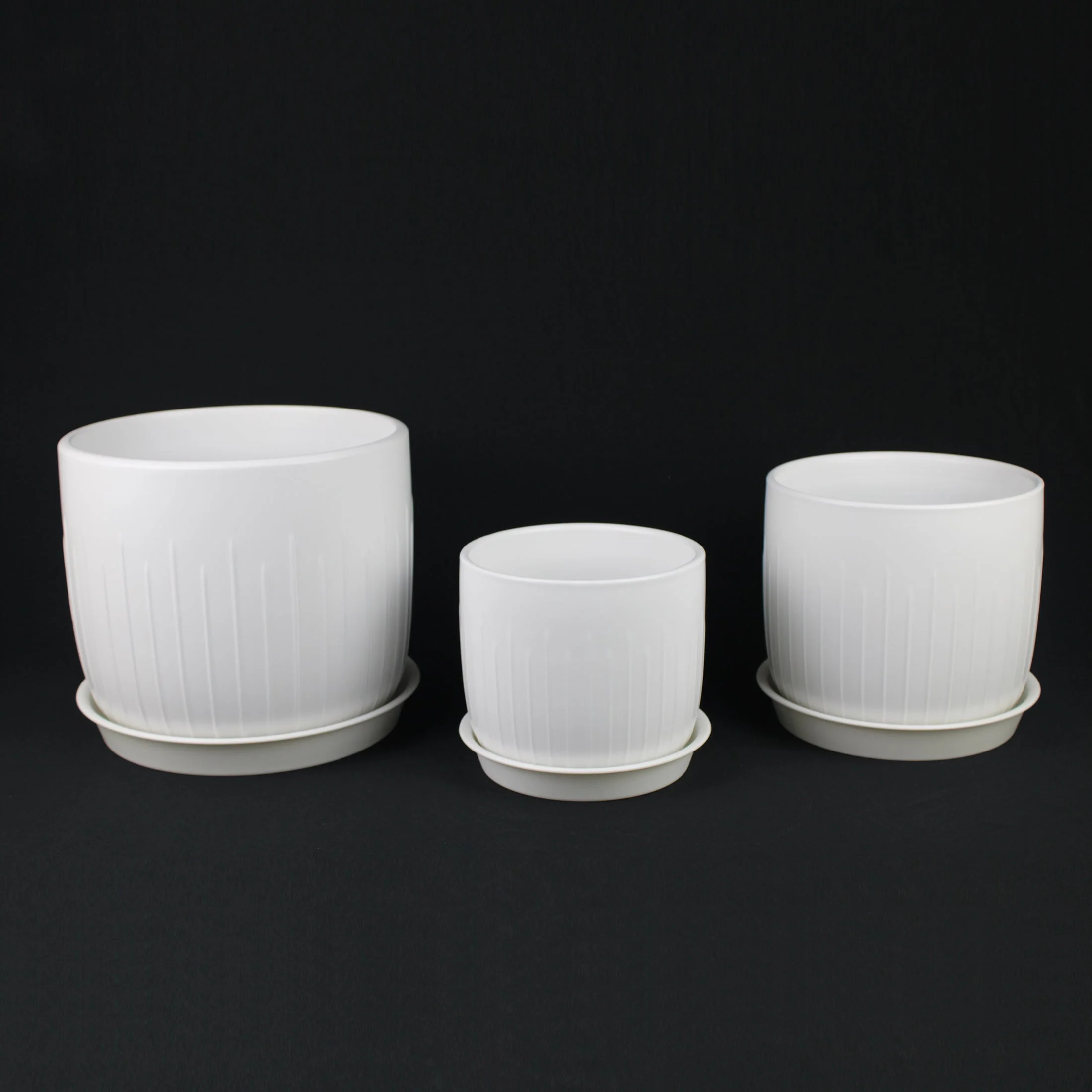 3-Piece White Stoneware Planter Pot Set with Vertical Groove Texture - Image 12